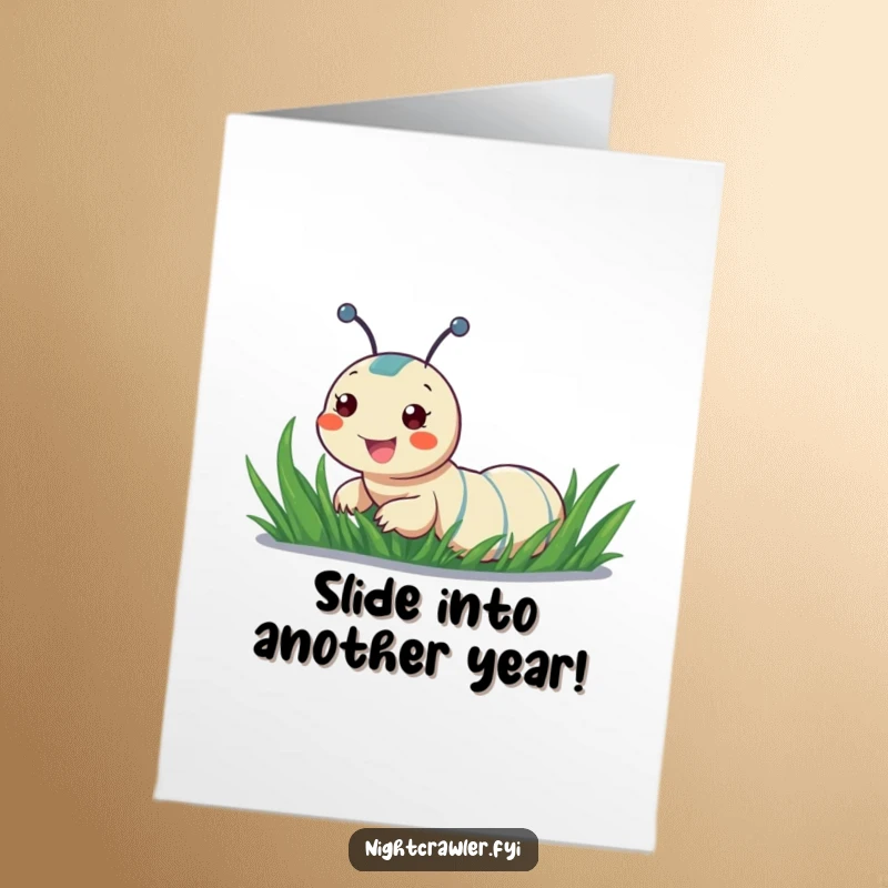 Funny Free Printable Birthday Card: A gleeful night crawler joyfully sliding down a wet blade of grass, a miniature adventure.