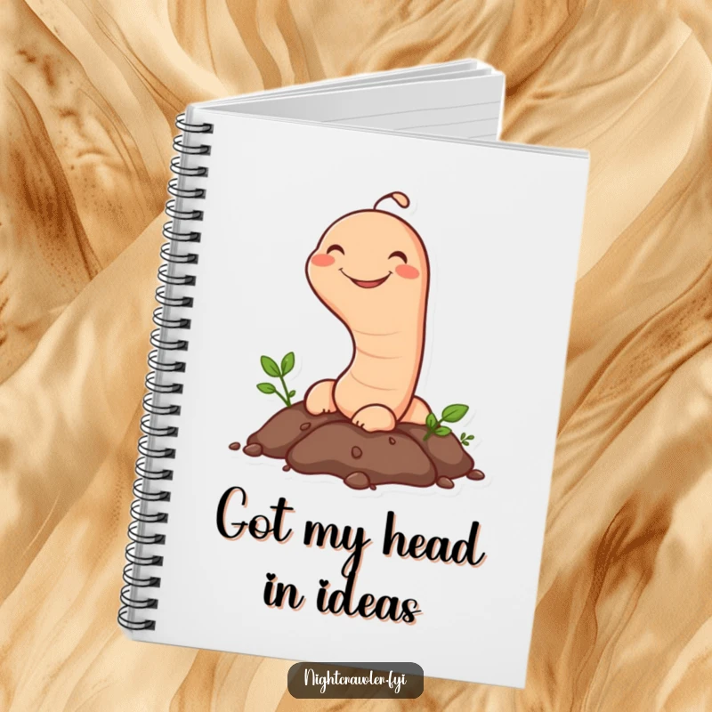 Funny Earthworm Notebook: A happy earthworm character emerges from the soil with a grin, designed for humorous and delightful note-taking.