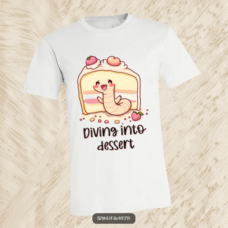 A funny cute earthworm joyfully tunneling through a huge piece of cake, illustrated on this humorous t-shirt.